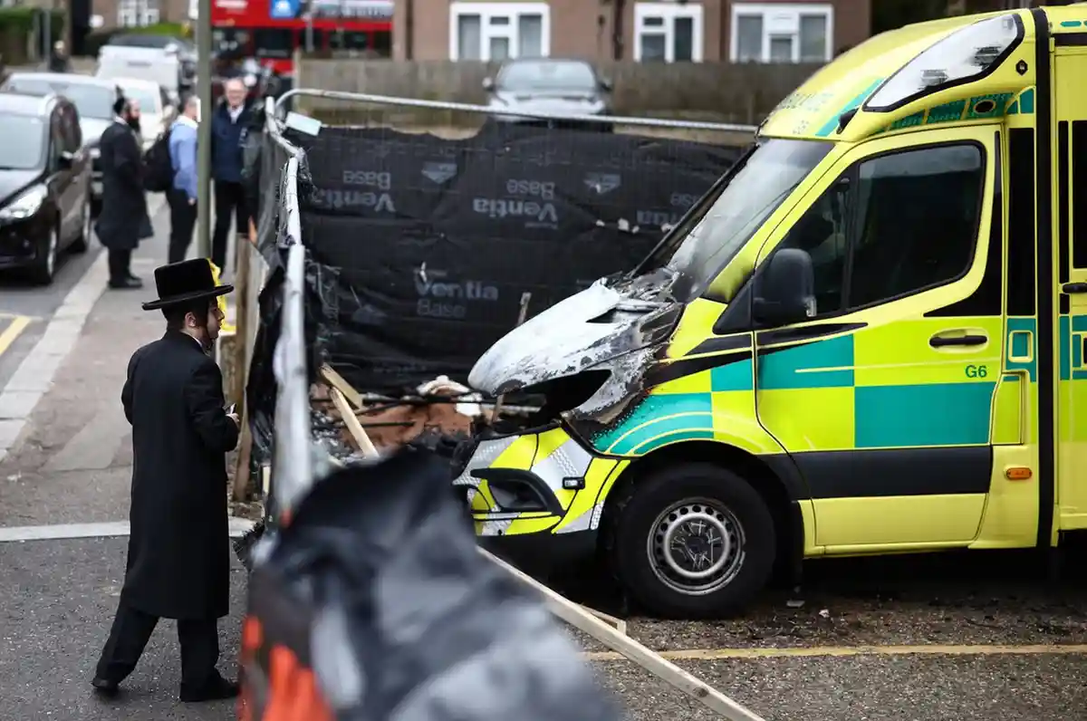 Metropolitan Police officers at crime scene in Golders Green after arson attack on Jewish ambulances