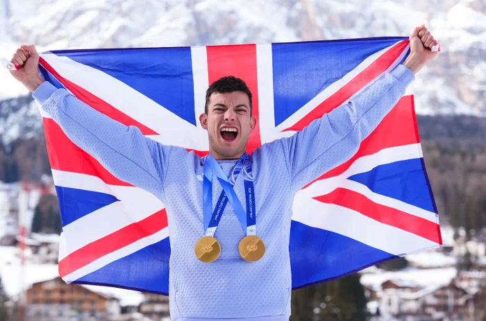 Team GB athletes celebrate at the Milano Cortina Winter Olympics medal ceremony